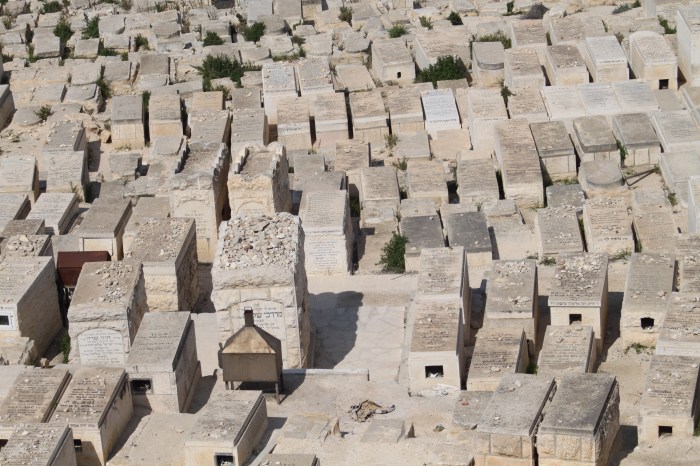 GravesOnHillsideWithRocks